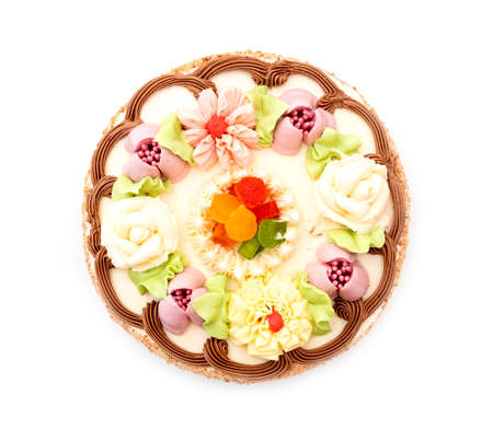 Round circle cake with cream isolated on white, top viewの写真素材