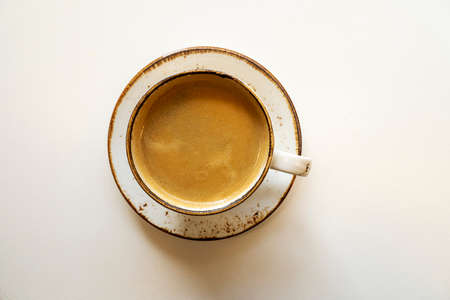 Black morning coffee on a table, top viewの写真素材