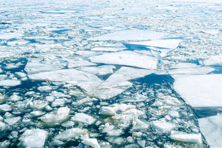 Cracked ice on the surface of the Ocean, concept picture about Climate change in the Worldの写真素材