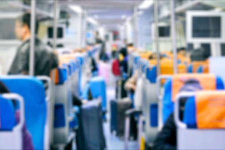 People going by train in Asia, defocesed blurred picture as backgroundの写真素材