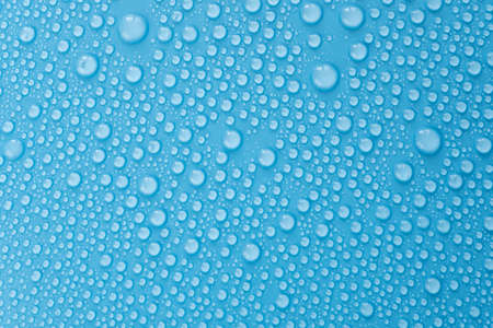 Water drops on blue background, top view of pattern with drop, flat lay as overlayの写真素材