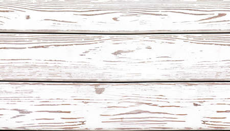 Long wooden boards with old white paint on surface as texture, backdrop or backgroundの写真素材
