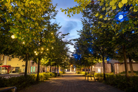 Boulevard of Ukraine with illumination yellow and blue lamps as symbol of Ukrainian flagの写真素材