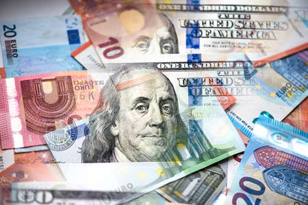 Euro and Dollars money as business background, concept picture about parity between two currenciesの写真素材