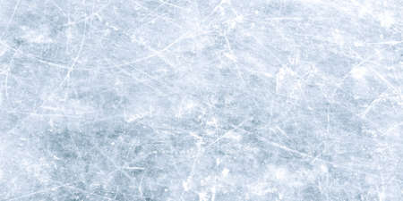 Natural scratched ice at the ice rink as texture or background for winter composition, large long pictureの写真素材