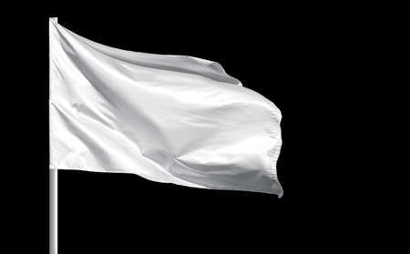 Fluttering blank white flag on flagpole isolated on black backgroundの写真素材