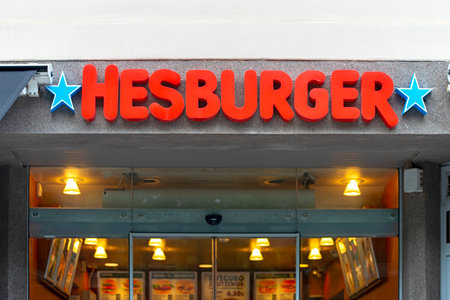 KAUNAS - JUL 10: Facade of Hesburger restaurant in Kaunas, July 10. 2022 in Lithuania. Hesburger is a fast food chain based in Turku, Finland.のeditorial素材
