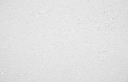 Wall with white lime plaster as textured backgroundの写真素材