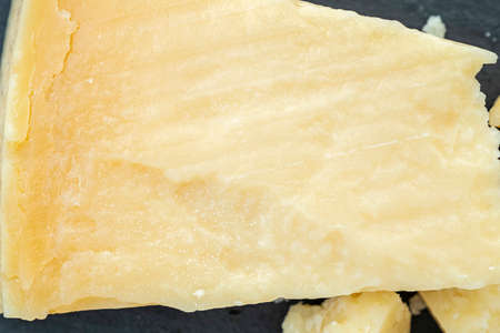 Close-up of Parmesan cheese, macro picture as texture for backgroundの写真素材