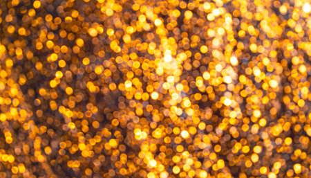 Blurred sparkling bokeh background or texture for festive ideasの写真素材