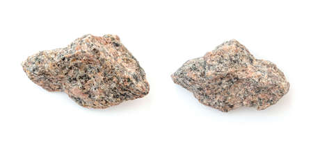 Two pieces of broken granite stones isolated on whiteの写真素材