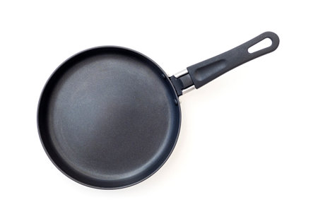 Black pan isolated on white, top viewの写真素材