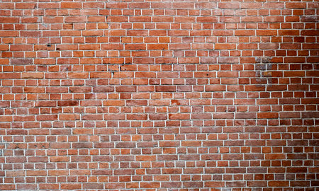 Urban background, long wall by old red brick in London as texture or backgroundの写真素材