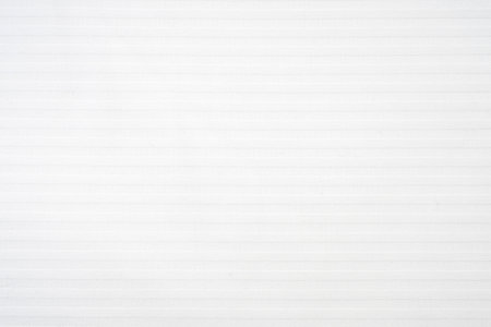 Smooth white bed sheet with horizontal lines as texture or backgroundの写真素材