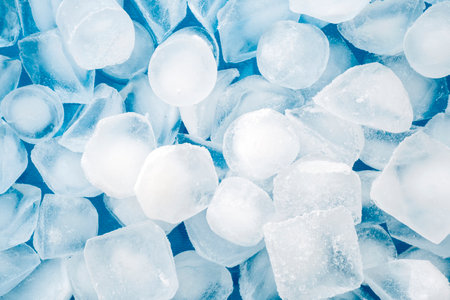 Abstract shapes of the ice on blue surface, top view for backgroundsの写真素材