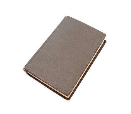 Closed brown old book with hard cardboard cover isolated on whiteの写真素材
