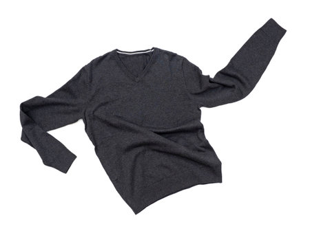 Dark gray cotton sweater isolated on white, top view. casual style.の写真素材