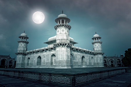 Amazing marble Tomb of Itimad-ud-Daulah or Baby Taj Mahal in the night with moon in Agra, India. Collageの写真素材