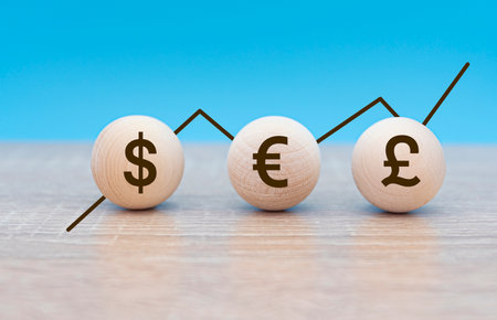 Three symbols of international currencies American dollar, Euro Pound sterling and rate chart, business conceptの写真素材