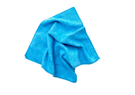 Blue rag, microfiber cloth for household, kitchen. Top view, isolated on white backgroundの写真素材
