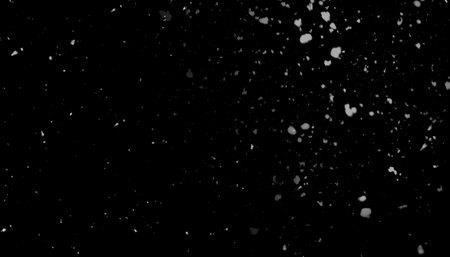 Snowfall, heavy snow, seasonal texture on black background as overlayの写真素材