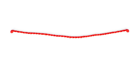 Thin red string or rope with knots isolated on whiteの写真素材