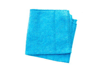 Folded blue rag for housework with soft texture isolated on white, top viewの写真素材