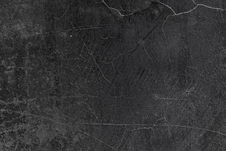 Black concrette wall, soot, carbon black, on the cement wall as texture or backgroundの写真素材