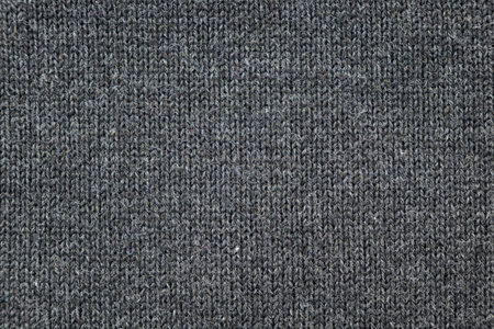 Surface of warm winter knitted gray sweater as background or texture, top viewの写真素材