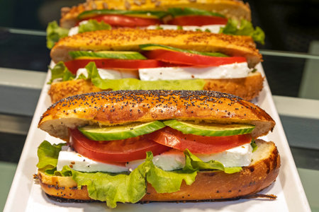 Showcase with vegetarian sandwiches in cafe, snacks for to goの写真素材