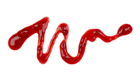 Line of red berry jam or syrup with bend isolated on whiteの写真素材