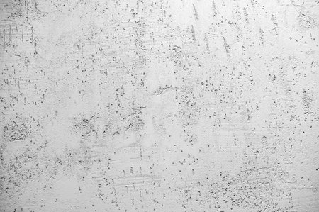 Mottled, speckled cement or concrete wall as texture, backgroundの写真素材
