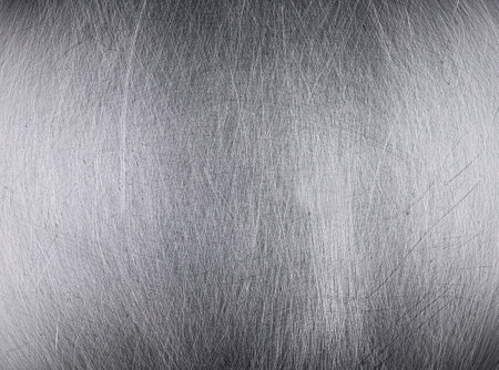 Blank silver metal, steel plate with scratchers as texture or backgroundの写真素材