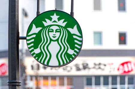 KOBE - JAN 04: New logotype of Starbucks cafe with mermaid in Kobe on January 04. 2017 in Japanのeditorial素材