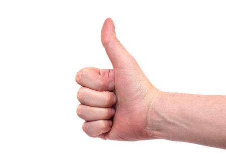 Man hand with thumb up isolated on white background. Yes, ok, cool gesture by arm of personの写真素材