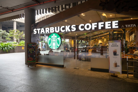 MUMBAI - SEPT 20: Exterior of Starbucks Coffee with logotype over entrance and visitors in Mumbai on September 20. 2022 in Indiaのeditorial素材