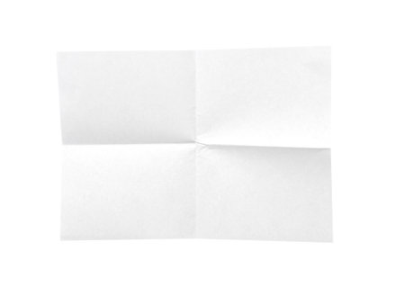 White blank folded page, sheet isolated on whiteの写真素材