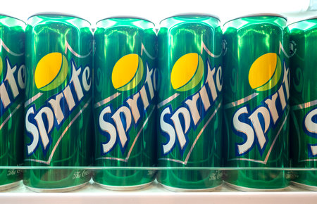 BERLIN - SEPT 20: Row of cans with Sprite logotype at grocery store in Berlin on September 20. 2022 in Germanyのeditorial素材