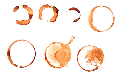 Set of coffee stains, mug imprints, random abstract brown patterns isolated on whiteの写真素材