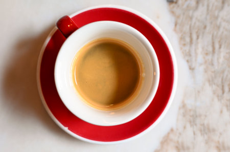 Cup with espresso black coffee, top viewの写真素材