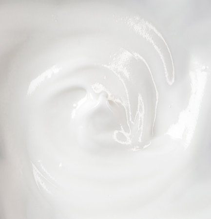 Cosmetic moisturizing body cream as texture or backgroundの写真素材