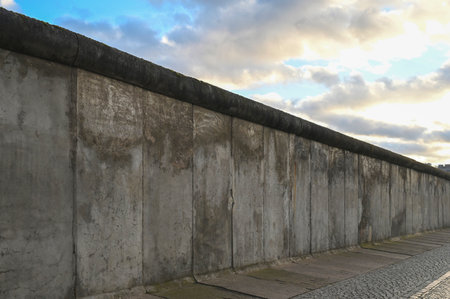Part of Berlin Wall or Berliner Mauer with blue skyの写真素材