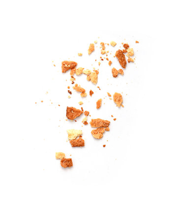 Heap of dry bread crumbs isolated on whiteの写真素材