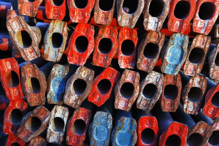 Red and Blue ledgers in scaffolding assortmentの写真素材