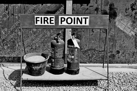 monochrome photo of fire point in construction site