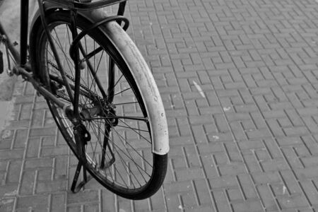 Retro style Bicycle in the street, a very old oneの写真素材