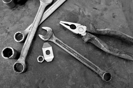 monochrome abstract of metal tools in machinery shopの写真素材