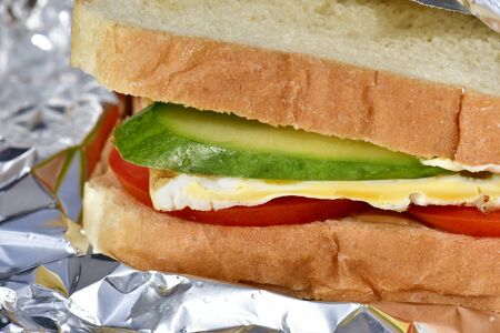 Sandwich for breakfast with vegetables and eggの写真素材