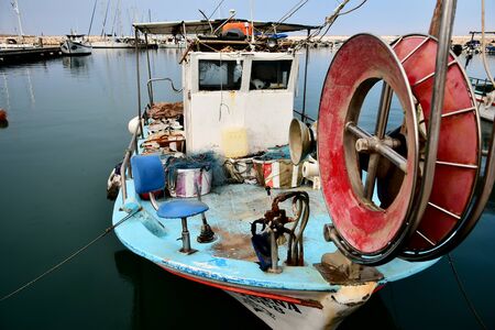 fishing boat  with a fishing net reel on the frontの写真素材
