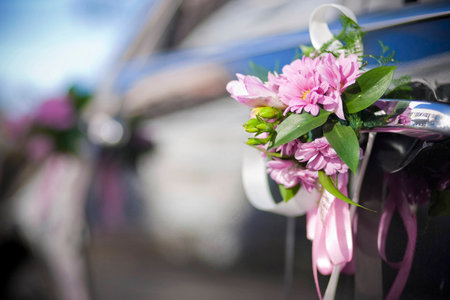 Luxury wedding car decorated with flowersの写真素材
